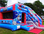 Super Heroes bouncy castle & slide